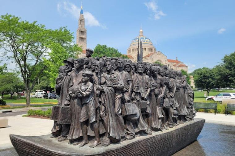 "Angels Unawares," a work by Timothy Schmalz on The Catholic University of America's campus, depicts 140 immigrants.