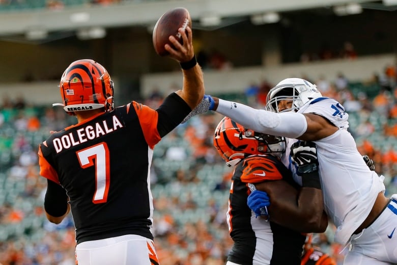Cincinnati Bengals quarterback Jake Dolegala (7) passes during the first half of an NFL preseason football game Aug. 29, 2019, in Cincinnati.