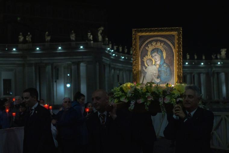 St. Peter’s Square was illuminated by candlelight the night of Saturday, May 20 as pilgrims prayed the Rosary in a procession in honor of the Blessed Virgin Mary.