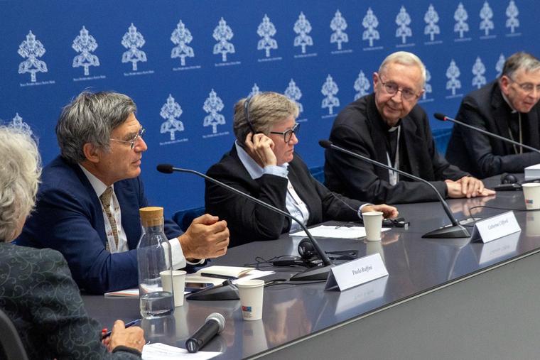 Participants in the first general ordinary assembly of the Synod on Synodality speak to the media Oct. 26 at the Vatican.