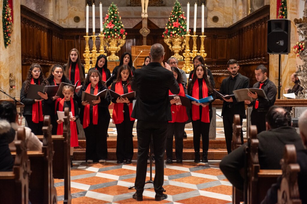 One of the parish choirs of the Church of St. Saviour  in Jerusalem performing at the prayer vigil in preparation for Christmas, held on Dec. 22 in Jerusalem. Credit: Marinella Bandini