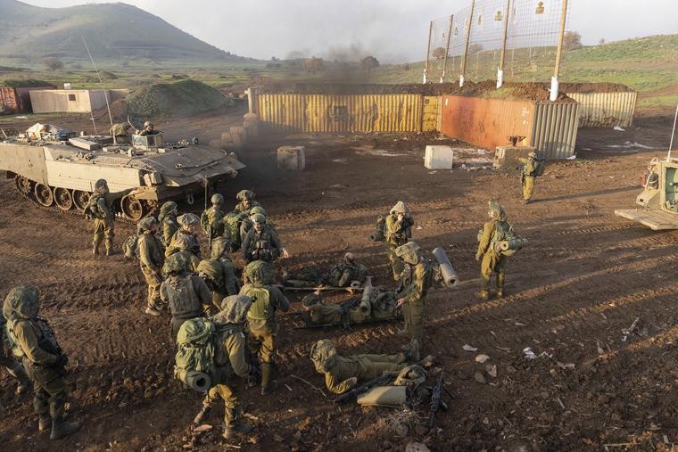 Israeli combat reservists and tank forces take part in training drills on the Lebanese front in the Israeli-controlled Golan Heights, Thursday, Jan. 4, 2024.