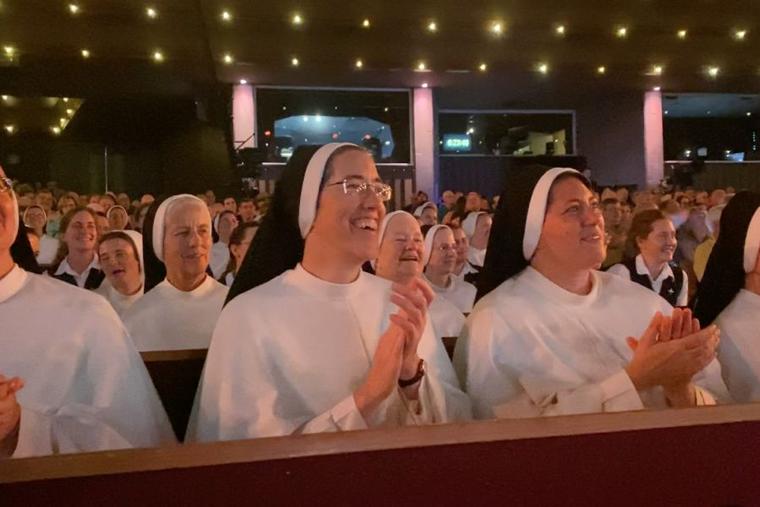 Members of the Dominican Sisters of Saint Cecilia enjoying a performance of The Hillbilly Thomists at the Grand Ole Opry in Nashville on Aug. 1, 2022.