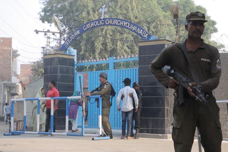 Security forces guard St. John’s Catholic Church in Youhanabad, Lahore, Pakistan, in 2019.