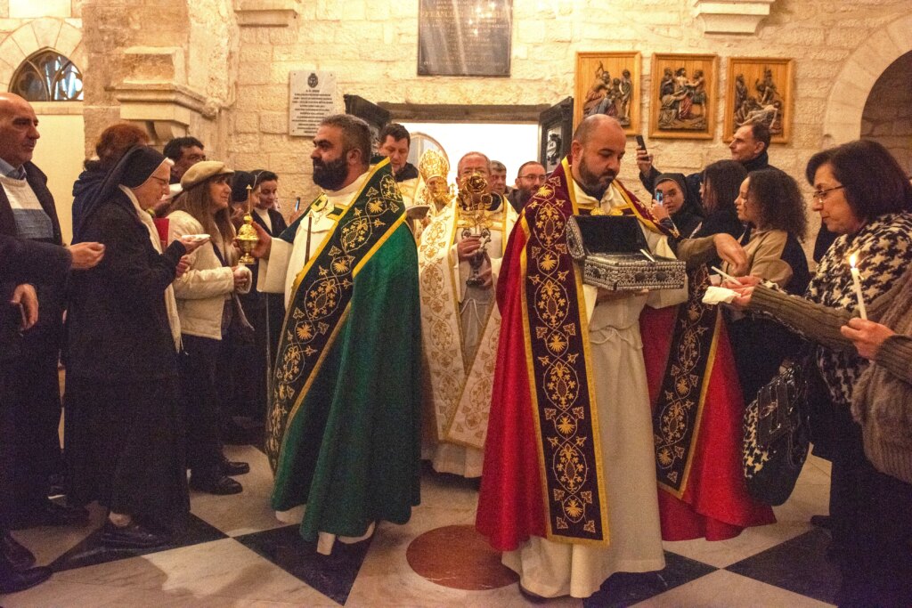 On the afternoon of Jan. 6, after the Second Vespers of the Epiphany and the adoration of the Baby Jesus in the Grotto of the Nativity in Bethlehem, three Franciscan friars of the Custody of the Holy Land portraying the Magi, distributed gifts (only incense and myrrh) to the gathered faithful in the church and the cloister of St. Catherine church in Bethlehem. Credit: Marinella Bandini
