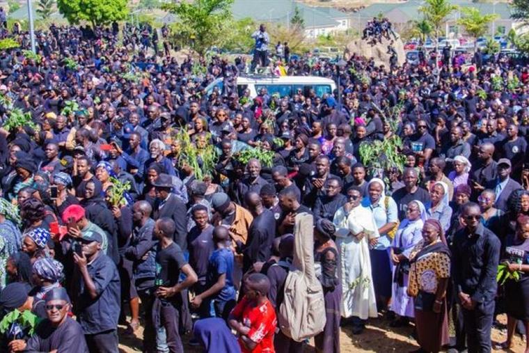 Thousands of Christians peacefully and prayerfully march to a rally in front of the Nigerian Plateau state governor's office building in protest of the 2023 Christmas massacre that left more than 200 Christian Nigerians dead, Jan. 8, 2024.