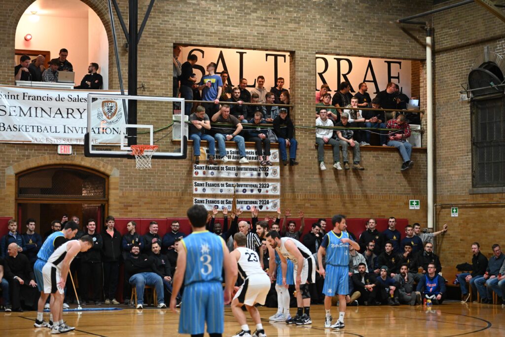 MAIN- The crowd was standing room only at Miller Gym for the semi-final game between Notre Dame and St. Francis de Sales at this year's De Sales Invitational