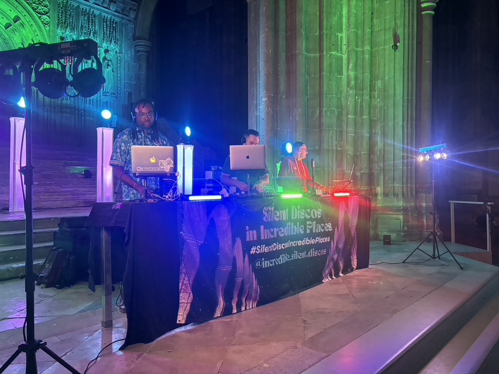 DJs play music inside Canterbury Cathedral.