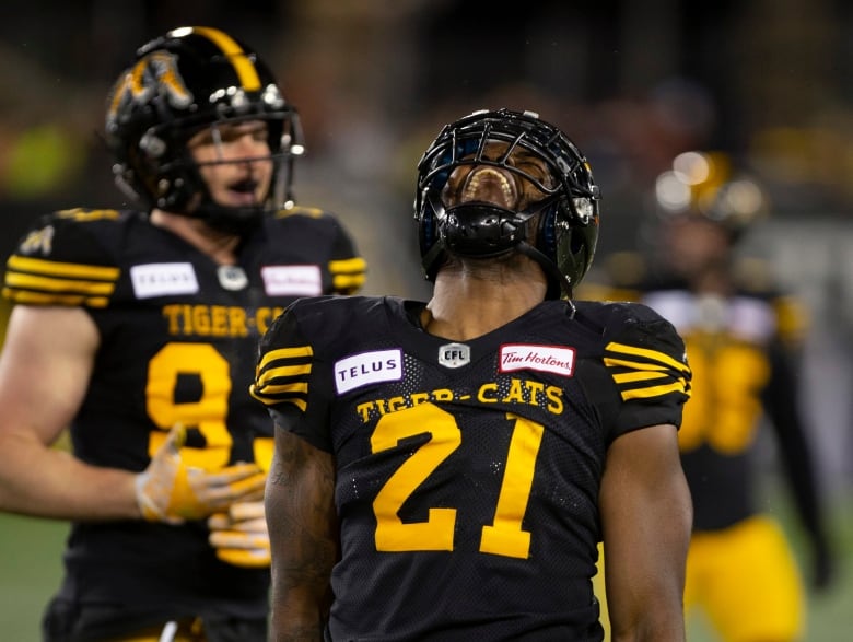 Hamilton Tiger Cats Simoni Lawrence celebrated a sack against the Saskatchewan Roughriders during second half CFL football game action in Hamilton on Thursday, June 13, 2019.