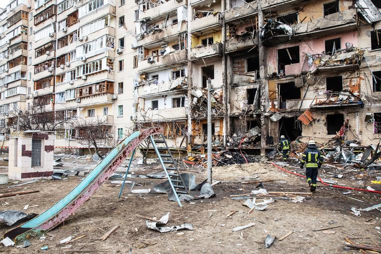 An apartment building stands damaged after a Russian attack in the Ukrainian capital of Kyiv.