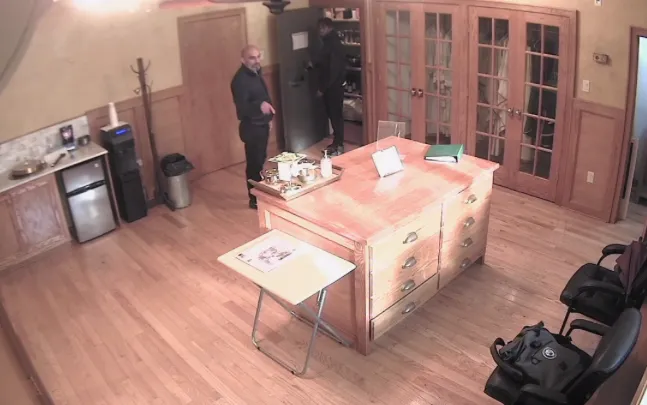 The individual impersonating a priest after being let it to St. Thomas Aquinas Church in Brooklyn. Credit: Diocese of Brooklyn