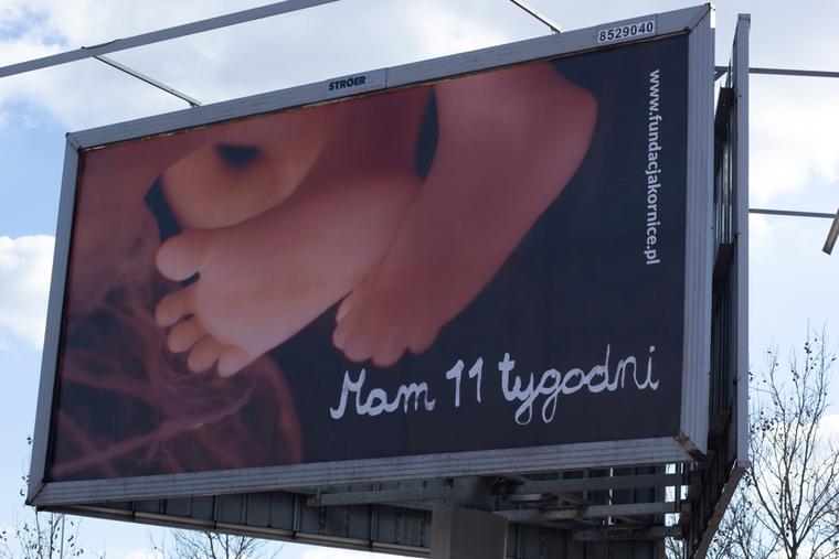 Pro-life campaign billboard in Warsaw portraying an 11-week unborn baby.
