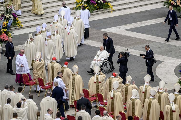 Pope Francis greets cardinals and bishops during the Easter Mass in St. Peter's Square on March 31.