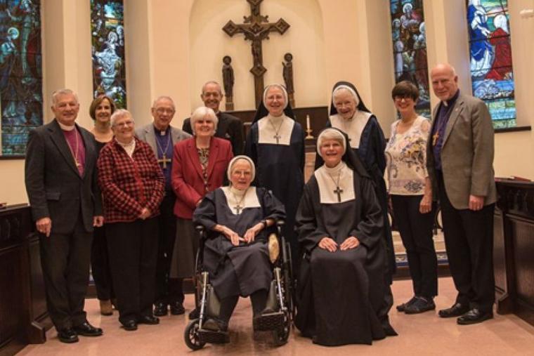 Anglican nuns from Sisterhood of Saint Mary (photographed with bishops from the Anglican Church of North America's Diocese of the Living Word) are among those suing the state of New York for requiring that they cover abortion in their health plans.