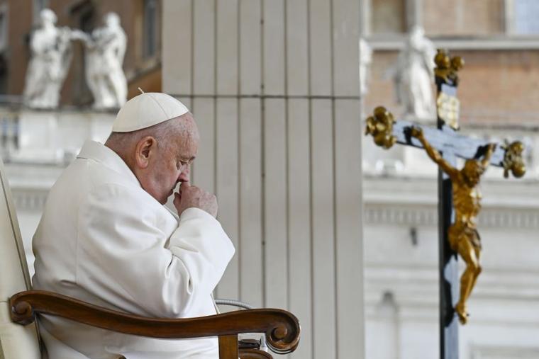 Pope Francis prays during his Wednesday general audience in St. Peter’s Square at the Vatican on April 24, 2024.