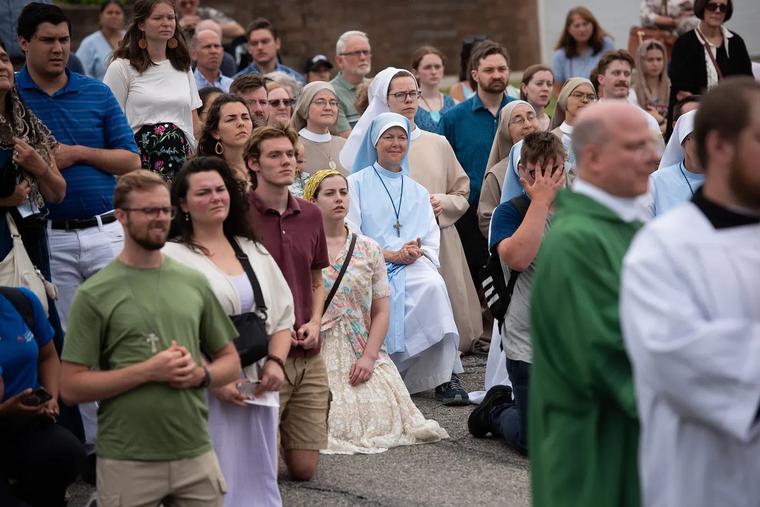 Catholic faithful wait for our Lord present in the Eucharist during the National Eucharistic Pilgrimage in Ohio.