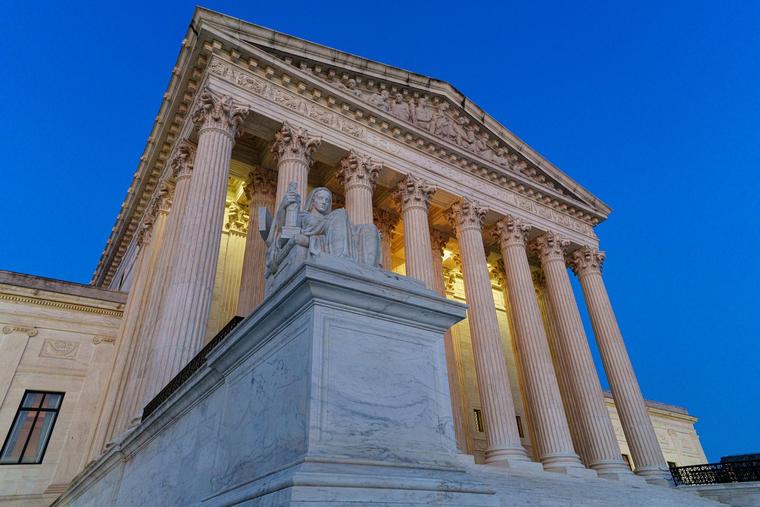 The front of the U.S. Supreme Court building is seen after sunset on June 24 in Washington, D.C.