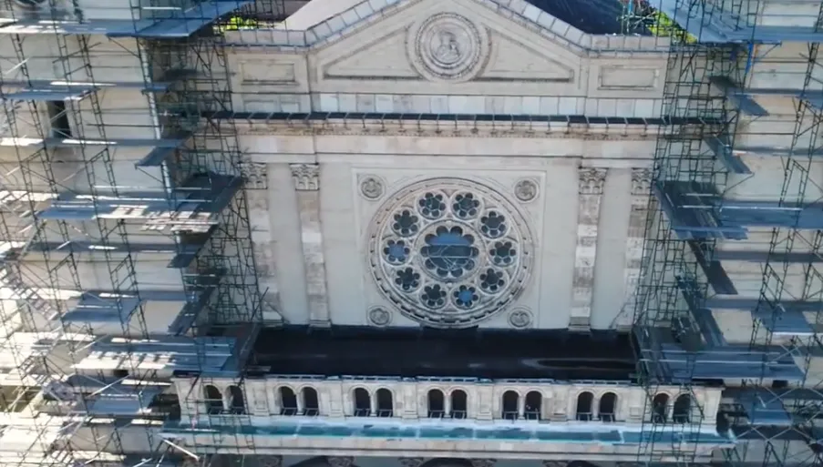 A rose window graces the top of St. Adalbert Parish in Chicago's Lower West Side, June 2018. Credit: Julię Sawicki/YouTube