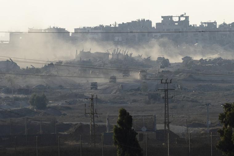 SOUTHERN ISRAEL, ISRAEL: An Israeli army convoy leaves the Gaza Strip as seen from a position on the Israeli side of the border on July 3, 2024 in Southern Israel.