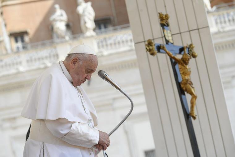 Pope Francis prays during his general audience on Wednesday, May 29,  2024, in St. Peter’s Square at the Vatican.