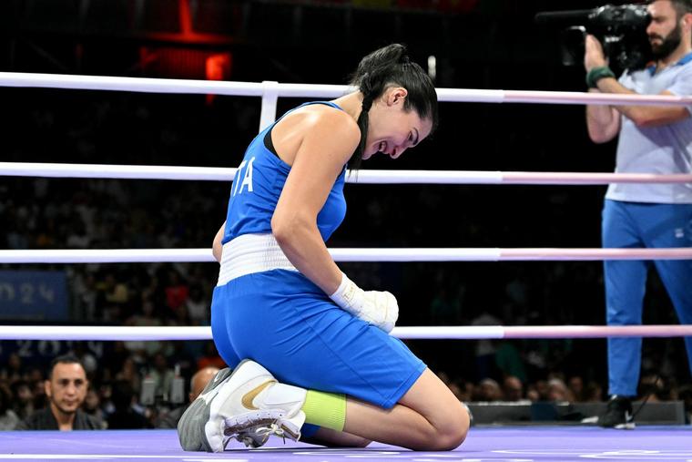 Italy's Angela Carini reacts during her women's 66kg preliminaries round of 16 boxing match against Algeria's Imane Khelif during the Paris 2024 Olympic Games at the North Paris Arena, in Villepinte on Aug. 1.