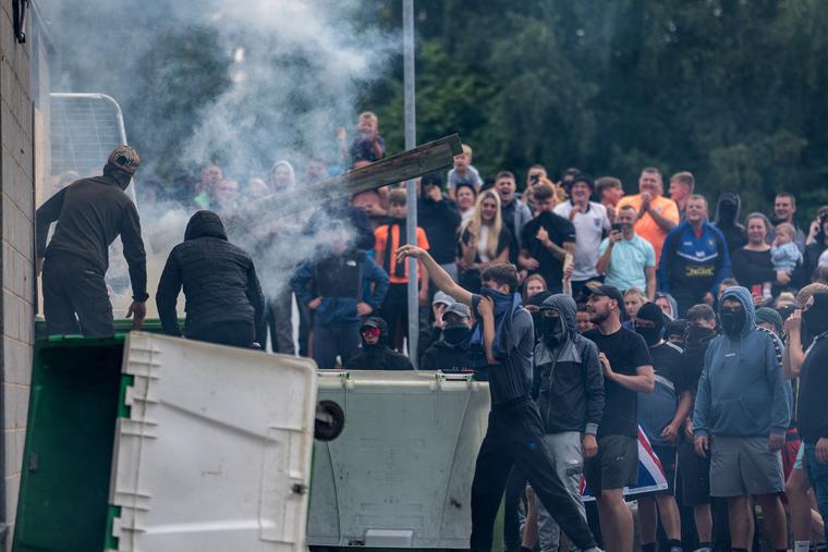 Protesters attempt to enter the Holiday Inn Express Hotel, which is housing asylum seekers, on Aug. 4, 2024, in Rotherham, United Kingdom.