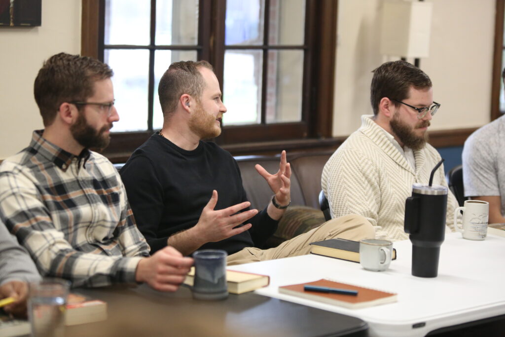 Seminarians John Dyson (Diocese of Boise), Daniel Dosche (Archdiocese of Saint Paul and Minneapolis) and Tim Guidry (Diocese of Crookston) respond to a question from Fr. Pietro Rossotti, adjunct instructor at The Saint Paul Seminary.