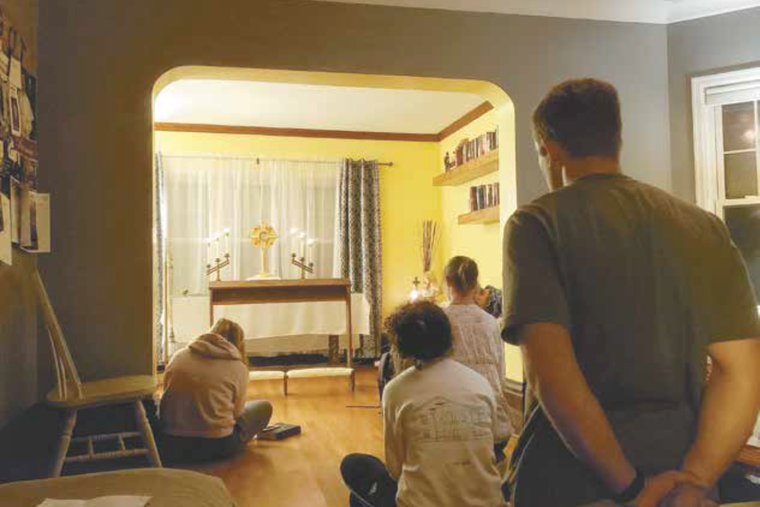 Catholic students enjoy fellowship together at ‘The Grotto’ at Hillsdale College in Hillsdale, Michigan.