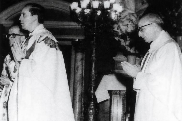 In this undated collect photograph, the future pope Jorge Mario Bergoglio (L) and the Jesuit superior general Pedro Arrupe (R) attend Mass.