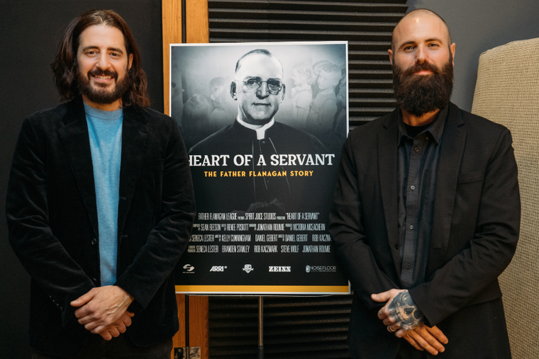 Co-Director Rob Kaczmark of Spirit Juice Studios stands beside Narrator Jonathan Roumie after the recording session.