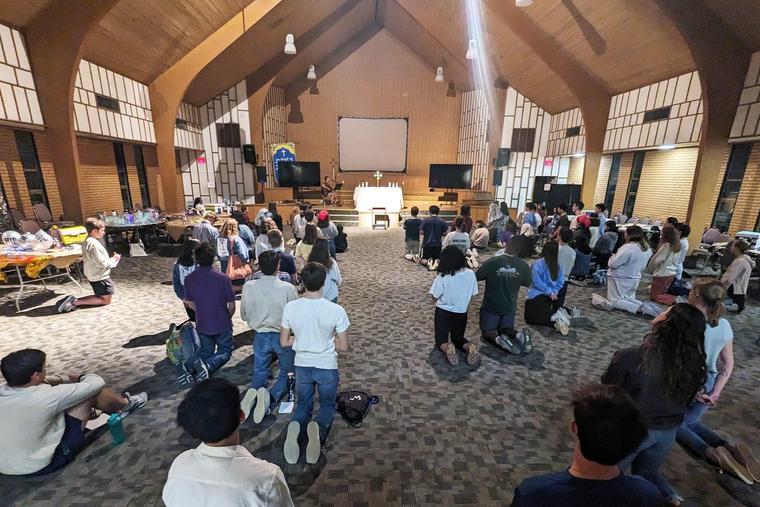 University of Dallas students gather in adoration before the Blessed Sacrament.