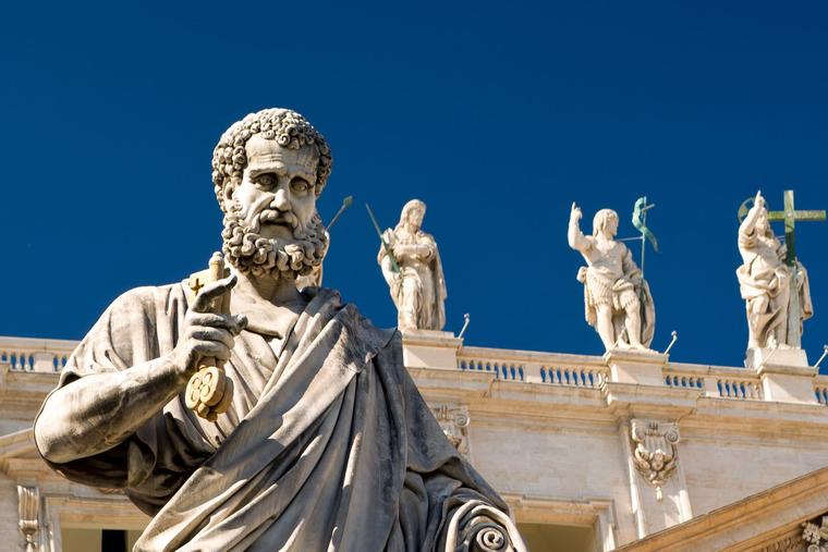 The statue of St. Peter stands in St. Peter’s Square at the Vatican