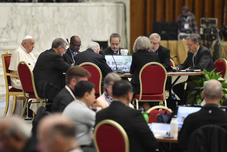 Pope Francis meets with other delegates of the Synod on Synodality at a roundtable discussion in Paul VI Hall at the Vatican on Oct. 17, 2024.