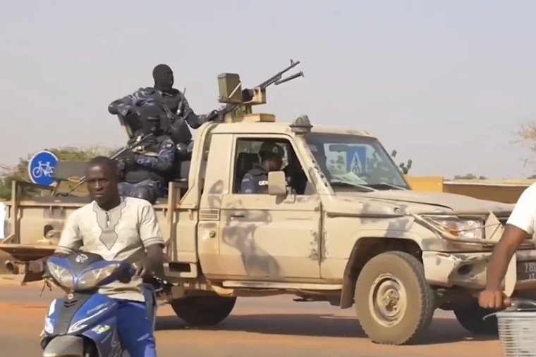 Burkinabé soldiers patrol in Ouagadougou after the January 2022 coup.