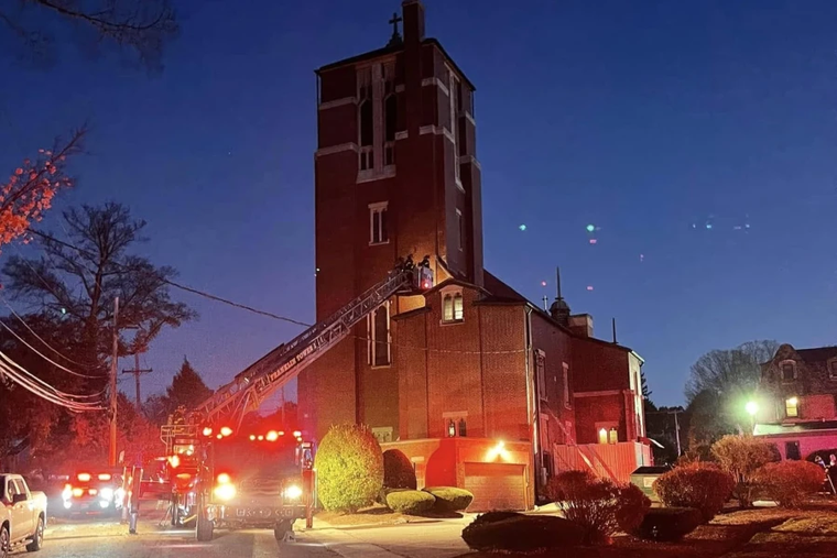 Firefighters work to extinguish a fire at St. Mary’s Parish in Franklin, Massachusetts, Wednesday, Oct. 23, 2024.