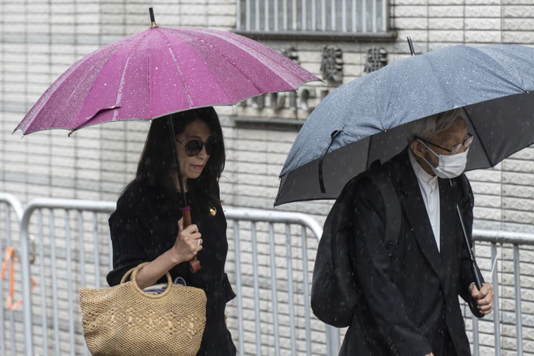 Jimmy Lai’s wife, Teresa (left), and retired Chinese Cardinal Joseph Zen Ze-Kiun arrive at the West Kowloon Magistrates’ Courts to attend Hong Kong activist publisher Lai’s national security trial in Hong Kong on Wednesday, Nov. 20, 2024.