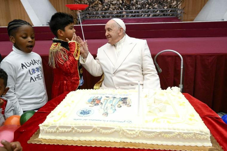 Pope Francis celebrates his birthday on Dec. 17, 2023, with children and families who are assisted by the Vatican’s Santa Marta Pediatric Dispensary.