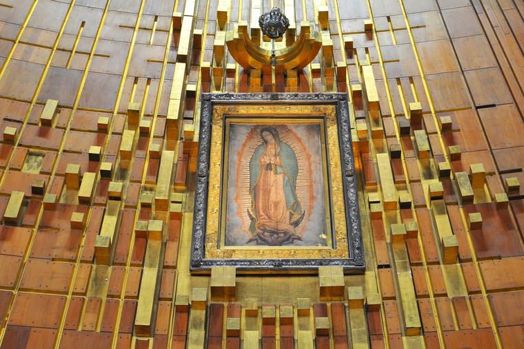 The original tilma of St. Juan Diego is displayed behind the main altar at the Basilica of Our Lady of Guadalupe in Mexico City.