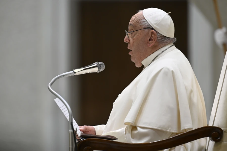 Pope Francis speaks to pilgrims gathered in the Paul VI Audience Hall for his general audience on Wednesday, Dec. 11, 2024, at the Vatican.