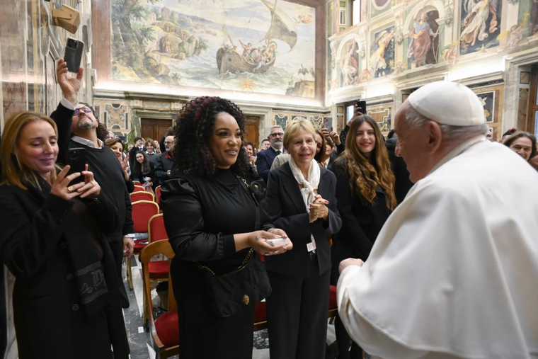Pope Francis greets artists and participants of the 2024 Vatican Christmas Concert in the Clementine Hall on Dec. 14, 2024.