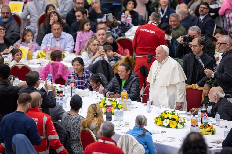 Pope Francis has had a full schedule these 365 days. Above, he joins the poor for lunch on Nov. 17.