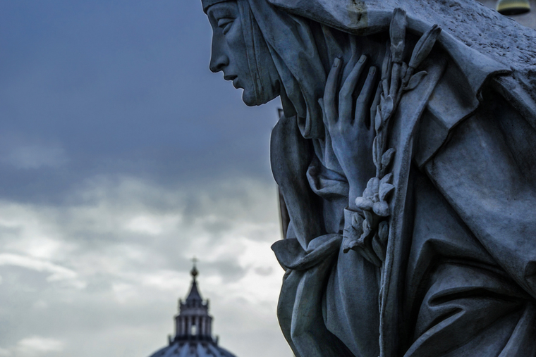 A statue of St. Catherine of Siena overlooks Rome.
