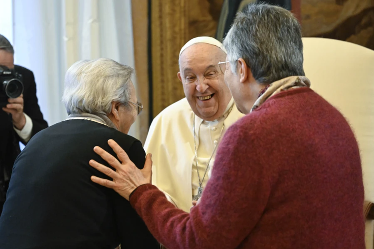 Pope Francis shares a joyful moment with members of the Union of St. Catherine of Siena Missionary Teachers during an audience in the Vatican's Clementine Hall, Jan. 4, 2025.
