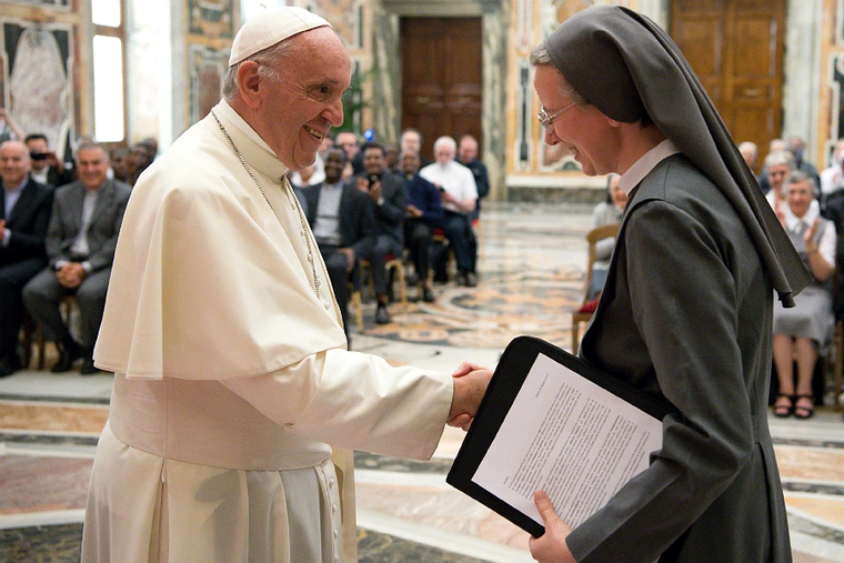 Pope Francis greets Sister Simona Brambilla, superior general of the Consolata Missionary Sisters, on June 5, 2017 in Clementine Hall at the Vatican.