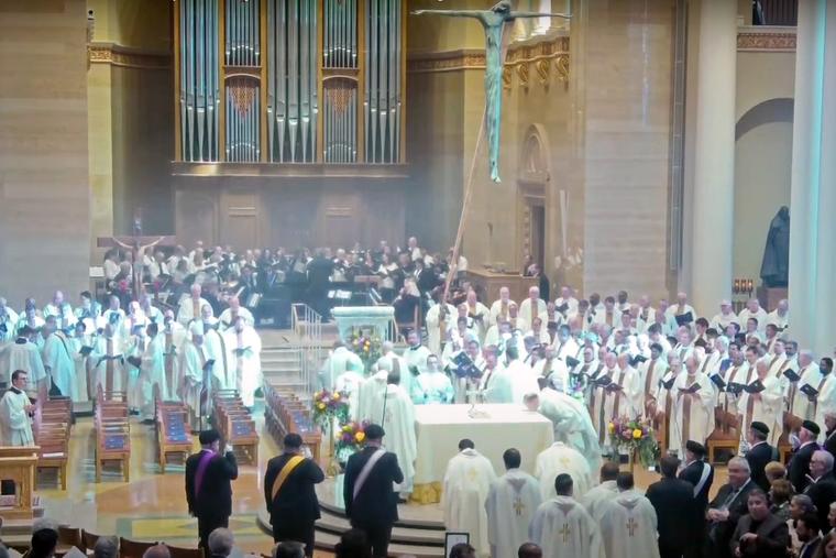 Priests process to the altar of the incense-filled Cathedral of St. John the Evangelist in Milwaukee at the beginning of Tuesday’s installation Mass of Archbishop Jeffrey Grob.