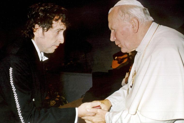 Pope John Paul II greets Bob Dylan after he performed in a concert during a Catholic youth rally  attended by the Supreme Pontiff in the city of Bologna, Italy.