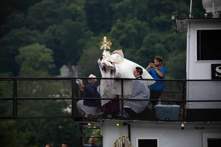 Jesus alive in the Real Presence goes by boat.