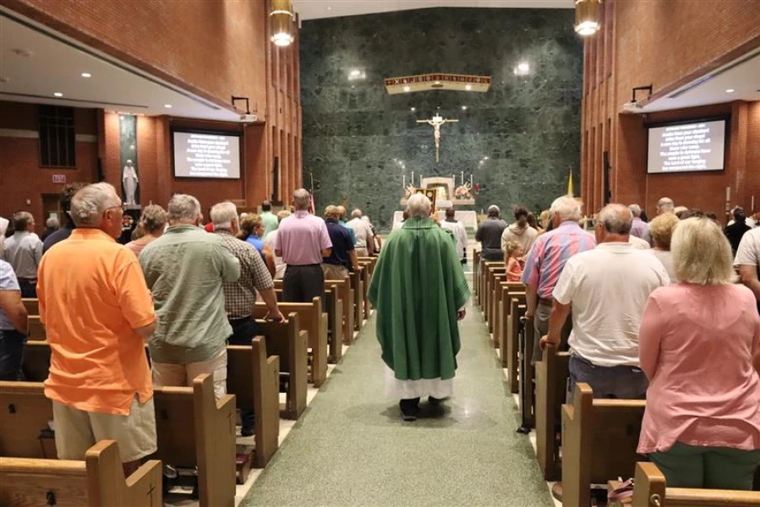 Parishioners attend a July 2024 Mass at St. Peter Church in Quincy, Illinois.