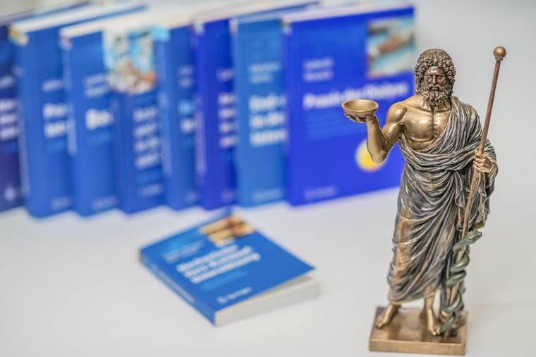 Hippocrates Figure and Medical Books
