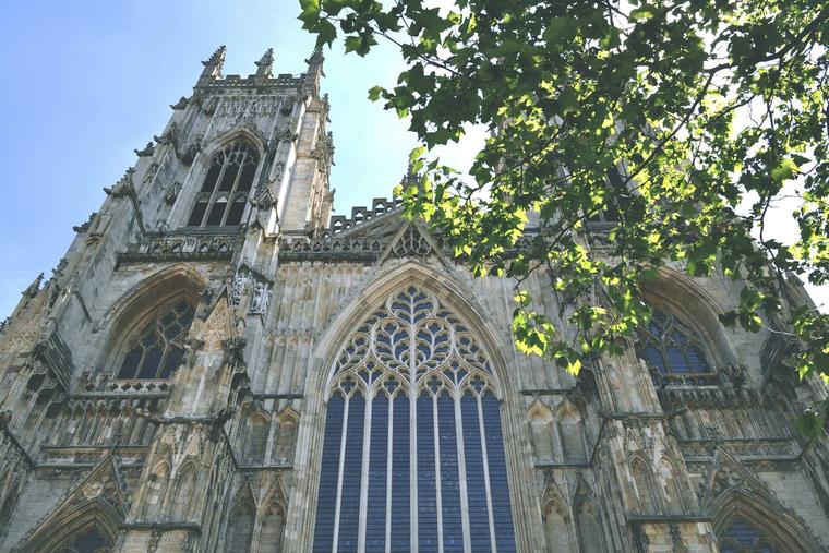 York Minster is the seat of the archbishop of York, the second-highest office of the Church of England; it was dedicated as a Catholic edifice in 1472, before the English Reformation.